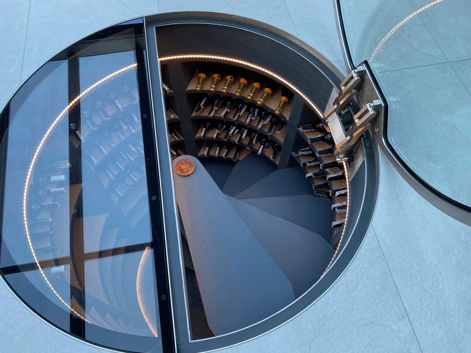 Cave à vin enterrée ronde avec porte vitrée